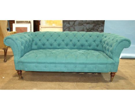 *Please note, all starred lots are sold at no reserve.*A Victorian Chesterfield settee with button back and seat, on turned w