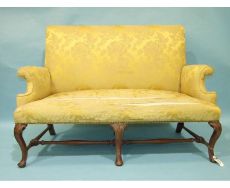 *Please note, all starred lots are sold at no reserve.*An 18th century three-seat settee of upholstered back, seat and scroll