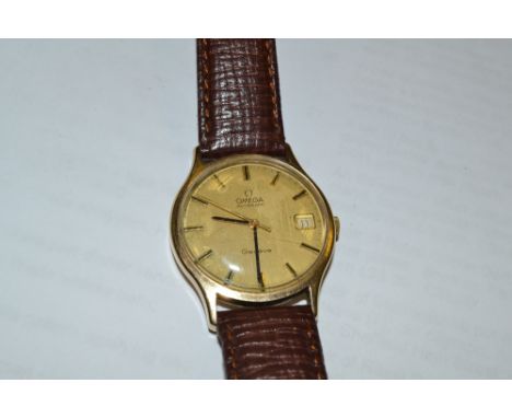 An Omega Automatic wristwatch, 9ct gold case, baton numerals, leather strap, c.1970