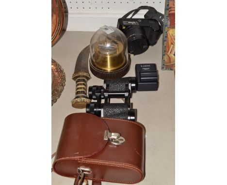 A pair of Carl Zeiss, Jena binoculars; a barometer, a Lumix Panasonic DMC FZ1B camera