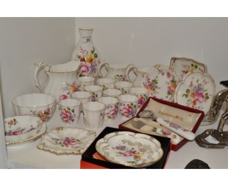 A set of eleven Royal Crown Derby Derby Posies fluted egg cups;  three jugs;  sugar bowl;  fluted vase;  trinket dishes;  etc