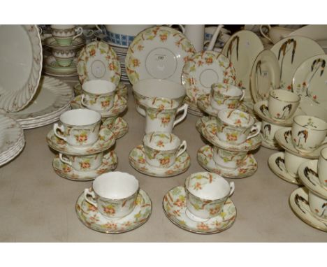 Ceramics - a Sutherland Art China tea set, decorated with roses and clematis entwined on a trellis, comprising sandwich plate