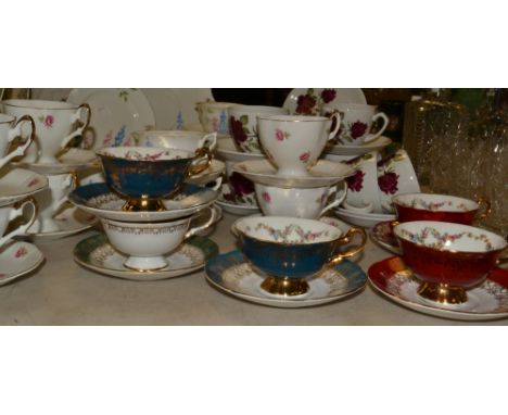 Teaware - a part tea set, painted with delphiniums on a white ground, comprising sandwich plate, six tea plates and saucers, 