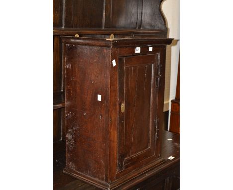 A George IV oak kitchen cupboard, fielded panel c.1830 