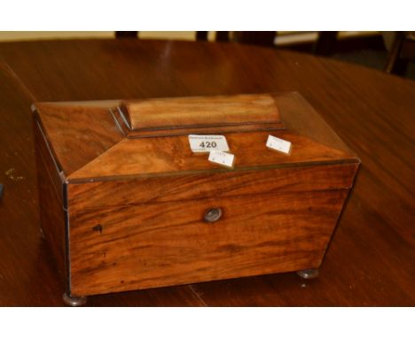 A George III walnut sarcophagus two section  tea caddy, bun feet, c.1820