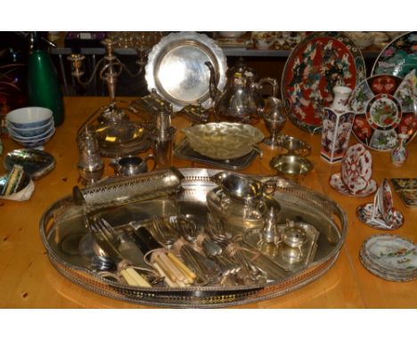 Silver Plated Ware - a silver plated teapot, chased and engraved overall; a silver plated gallery tray , table sugar scuttle;