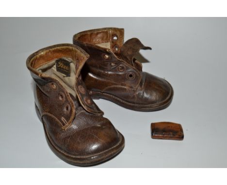 A pair of early 20th century Fivto toddlers leather ankle boots, size 3;  a small snuff box 