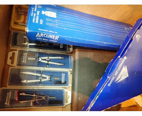 Collection of boxed technical drawing instruments including compass
