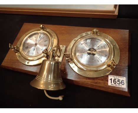 Weathermaster Spectrum quartz clock and barometer and ships style bell on mahogany mount in the form of portholes