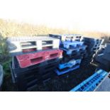 Quantity of plastic pallets.