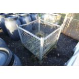 Metal stillage with mesh sides, approx. 35" wide x 35" deep x 35" high.