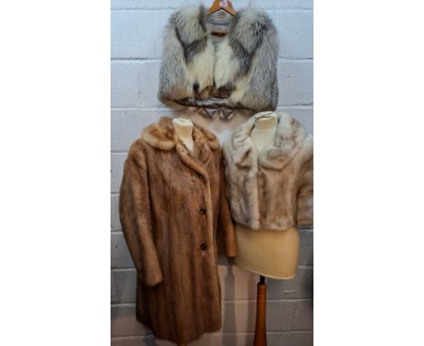 A brown mink coat, approx 40" chest, an arctic fox cape, an arctic mink bolero jacket approx 34" chest and a group of fur sto