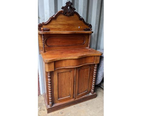 A Victorian mahogany serpentine fronted chiffonier having a raised back with bobbin turned columns 154cm h x 86cm w Location: