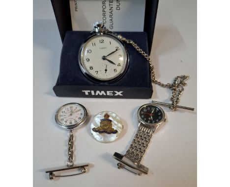 A 1980's Timex pocket watch, 2 nurse's watches, a Smiths ladies gold tone cocktail watch and a WW1 Artillery sweetheart brooc