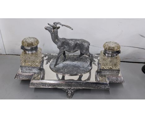 A Victorian silver plated double inkwell desk stand by James Dixon & Sons, cast with a deer to the centre, 15.5cm h x 26cm wL