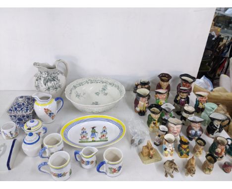 A collection of ceramics to include a 20th century Quimper ware part tea service, a collection of porcelain character jugs an