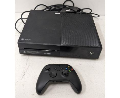A X-Box One console with a wireless controller Location:If there is no condition report shown, please request