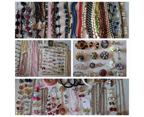 A quantity of vintage costume jewellery, mainly bead necklaces and earrings to include a Monet simulated pearl necklace with 