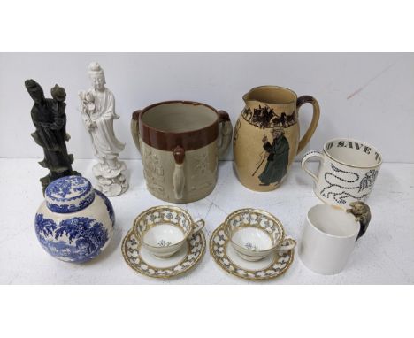 A mixed lot to include a Chinese blanc de chine glazed figurine, a Doulton tyg, two Grosvenor cups and saucers, and other ite