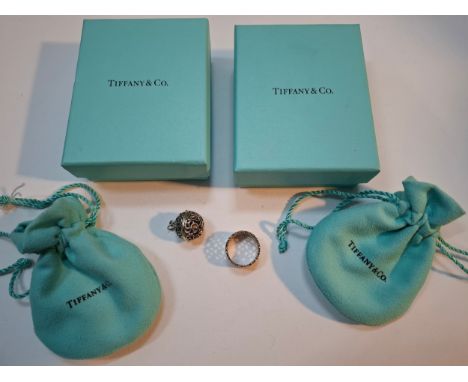 Tiffany & Co- A Paloma Picasso silver ring with heart design together with a white metal filigree pendant/charm with floral d