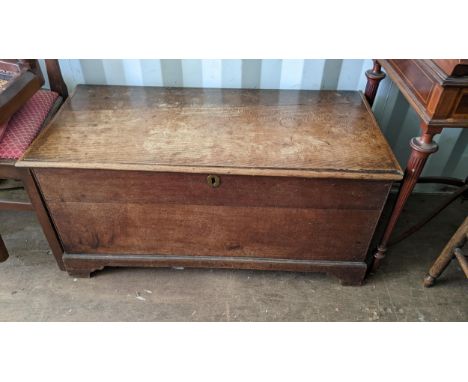 An 18th century oak coffer having a hinged top and on bracket shaped feet, 47cm h x 97cm wLocation: BBconIf there is no condi