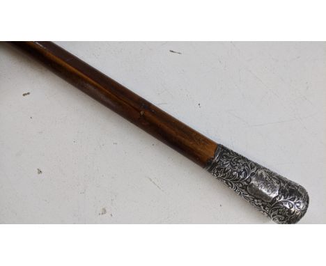 A late 19th/early 20th century Malacca walking stick with a cast white metal floral gripLocation: rostrumIf there is no condi