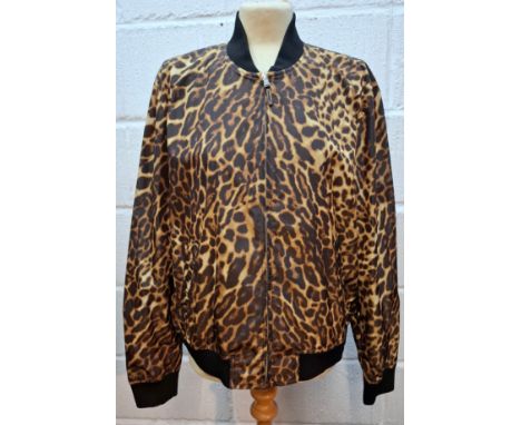 Ralph Lauren- A waterproof bomber jacket in an animal print having elasticated fabric cuffs and waistband with front zip fast