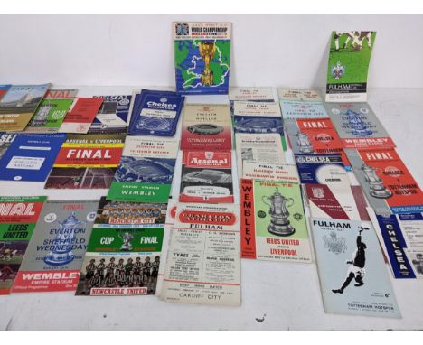 A collection of historic football programmes to include a 1966 World Cup souvenir programme weighing 151.7g, a 1972 FA Cup Fi