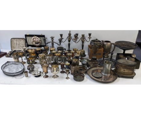 A mixed lot of silver plate to include candelabras, pierced centre bowl, tankard, table lighter and other itemsLocation:If th