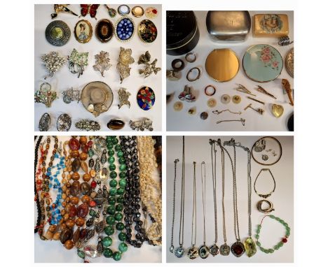 A quantity of costume jewellery and small collectables to include a 1970's Stratton compact, cufflinks, a malachite bead neck