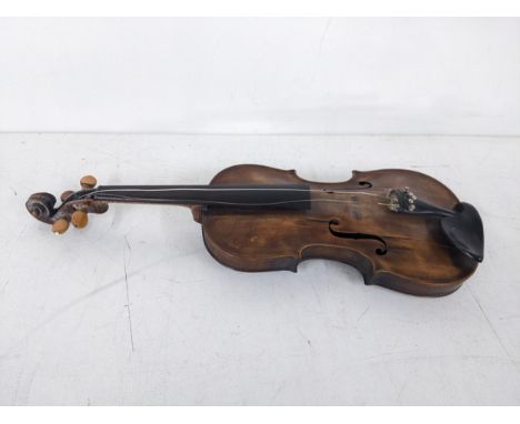 A Vintage violin marked inside 'Jacobus Stainer in Absam prope oenipontum 17' A/F, the body measuring 36cm longLocation: 1-5I