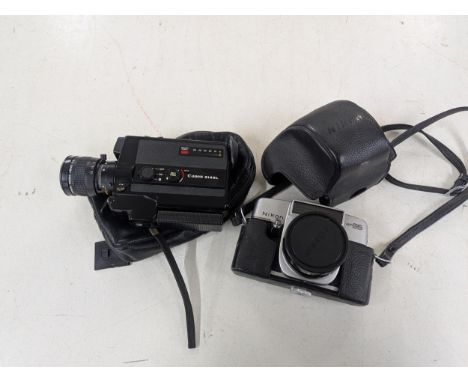 A Canon 514XL camera with 9:45 lens, along with a Nikon Auto 35 Location:If there is no condition report shown, please reques