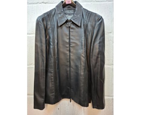 A ladies modern Haunt black soft leather jacket having a front zip fastening, UK14. Location:RailIf there is no condition rep