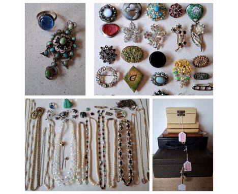 Four jewellery boxes and a jewellery wallet to include a Victorian Brahma green leather box with 2 keys and contents  compris