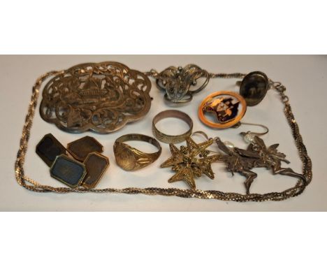 A small quantity of silver and white metal jewellery to include early 20th Century brooches, white metal fairy earrings, a pa