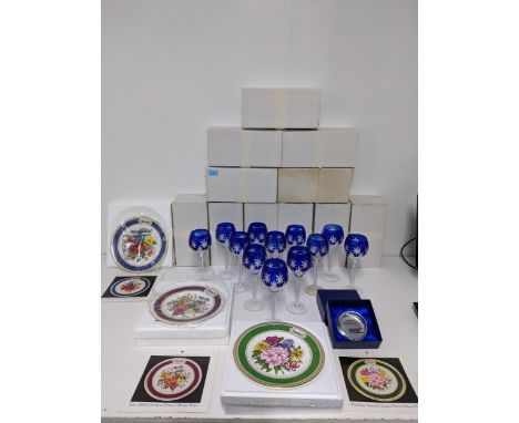 A set of twelve blue overlaid and cut crystal hock glasses, (1 A/F), and a boxed RAC glass advertising paperweight in recogni