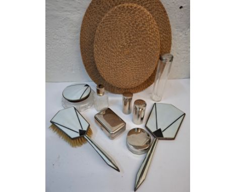 An Art Deco 3-piece white and black guilloche dressing table set, chrome and glass vanity case contents and a British Made st