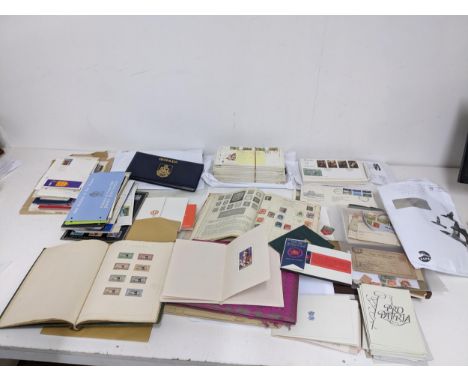A collection of stamps to include two stamp albums containing worldwide stamps, various 1st day covers, definitive and specia