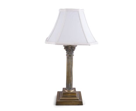 A BRASS CORINTHIAN COLUMN TABLE LAMP AND SHADE 