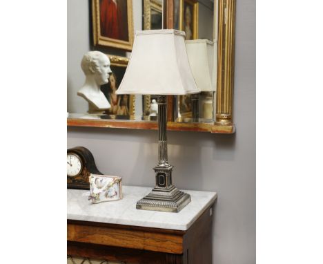 ***ADDITIONAL LOT***A SILVER PLATED CORINTHIAN COLUMN TABLE LAMP, raised on an architectural stepped platform base, 43cm high