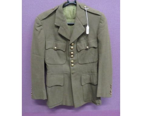 Coldstream Guards Officer's Service Dress Tunickhaki, single breasted, open collar tunic.  Patch chest pockets with buttoned 