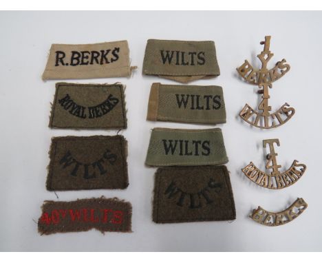 Selection of Wiltshire and R Berks Titlesincluding red embroidery on khaki 40th Wilts ... Brass T4 Wilts ... Brass T4 Royal B