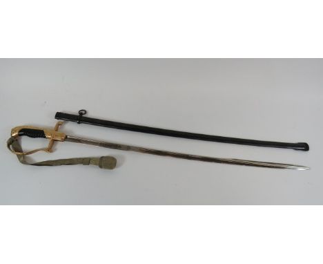 German Made Argentine Army Sword31 3/4 inch, single edged, slightly curved pipe back blade with quill point.  Etched foliage 