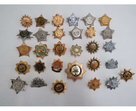 Selection of Southern African Police Badgesincluding gilt and enamel Lebowa ... Gilt and enamel Kangwane ... Chrome Royal Les