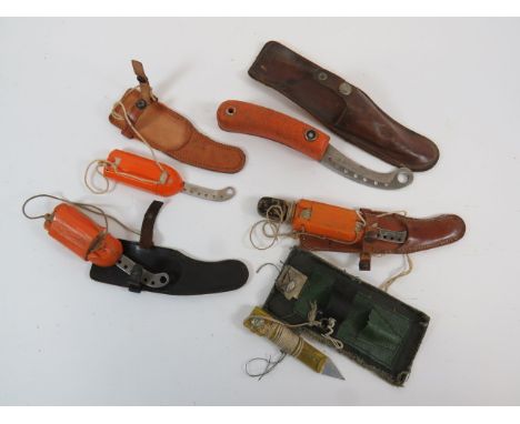 Good Selection of Dinghy Knivesconsisting large variant.  Curved blade stamped 27C/2023.  Orange cork handle.  Contained in i