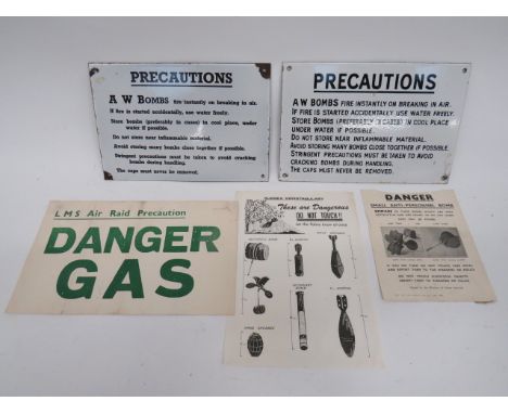 Good Selection of Ordnance Signs and Paperworkconsisting two 8 x 12 inch, white and black enamelled steel signs for 'A W Bomb