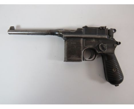 Deactivated Mauser Contract Schnellfeurer Auto Pistol7.65 mm, 5 1/2 inch barrel with fixed front sight. Blued top slide with 