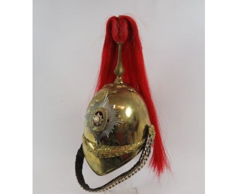 Royal Dragoons Cavalry 1871 Pattern Helmethigh brass crown with pointed peak and rounded rear brim.  Oak leaf and laurel band