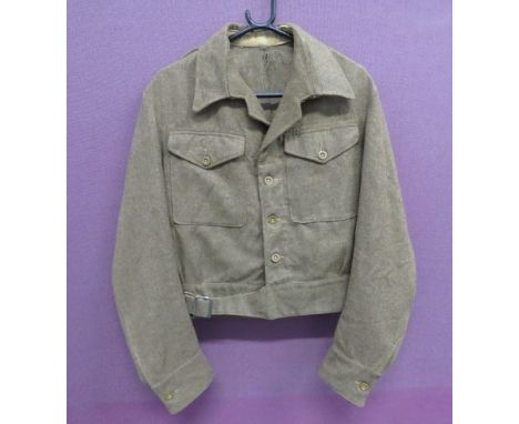 1945 Dated 1940 Pattern Battle Dress Jacketkhaki, single breasted, converted open collar tunic.  Patch chest pockets with but