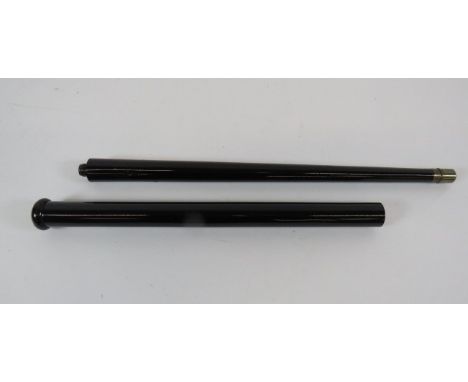 Victorian Air Gun Cane Stickblack lacquered steel walking stick.  Screw off top reservoir with polished wooden top knob.  Low